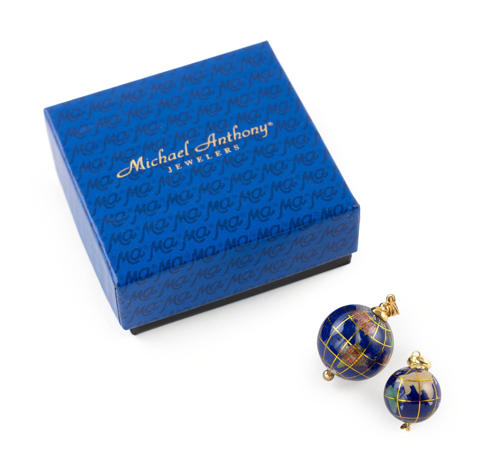 TWO MICHAEL ANTHONY 14KT YELLOW GOLD, LAPIS LAZULI, MOTHER-OF-PEARL AND STONE INLAY GLOBE: TWO MICHAEL ANTHONY 14KT YELLOW GOLD, LAPIS LAZULI, MOTHER-OF-PEARL AND STONE INLAY GLOBE CHARM/PENDANTS Each bale stamped "14k MA". Approx. 15.0 x 21.0mm and 20.0 x 29.0mm. Approx. 6.3 total dwt.