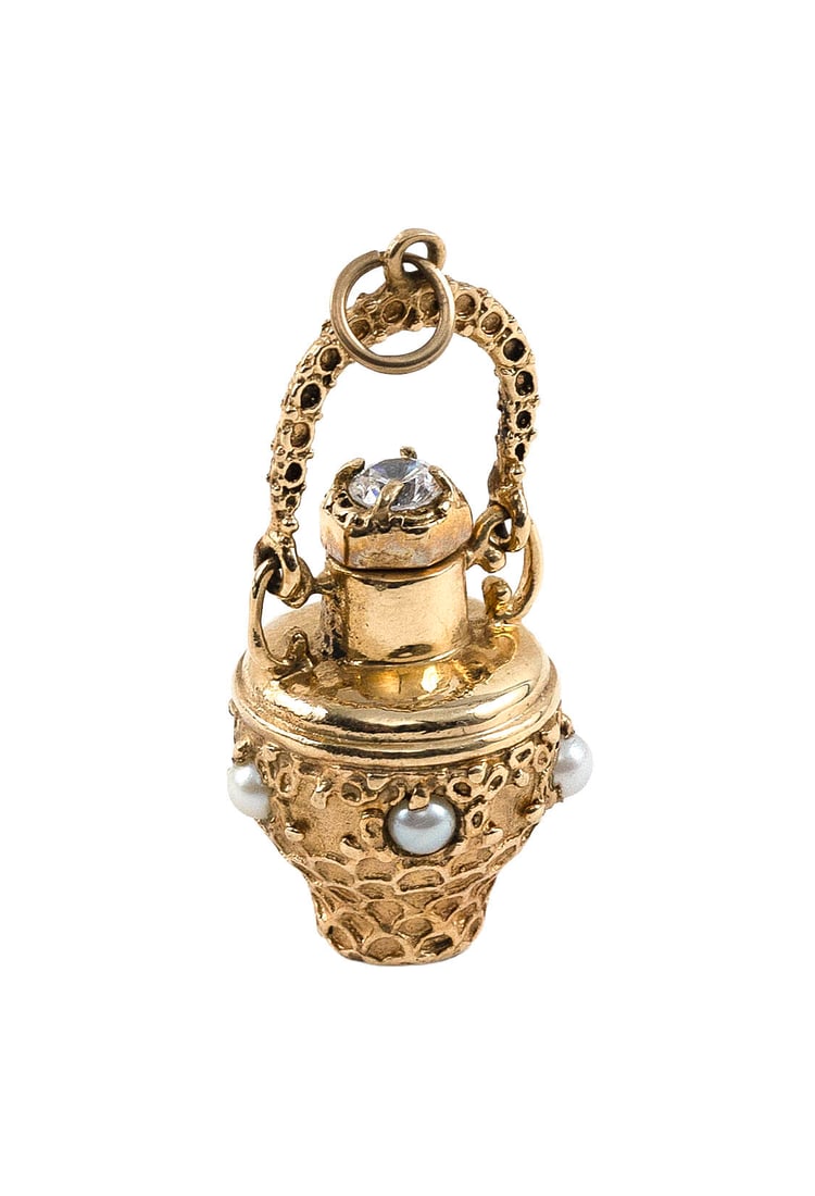 14KT YELLOW GOLD, DIAMOND AND PEARL BASKET PENDANT Approx. 6.2 total dwt.: 14KT YELLOW GOLD, DIAMOND AND PEARL BASKET PENDANT Five approx. 3.0mm round pearls and one approx. 0.20 ct. round-cut diamond. Approx. 16.0 x 37.0mm. Approx. 6.2 total dwt.