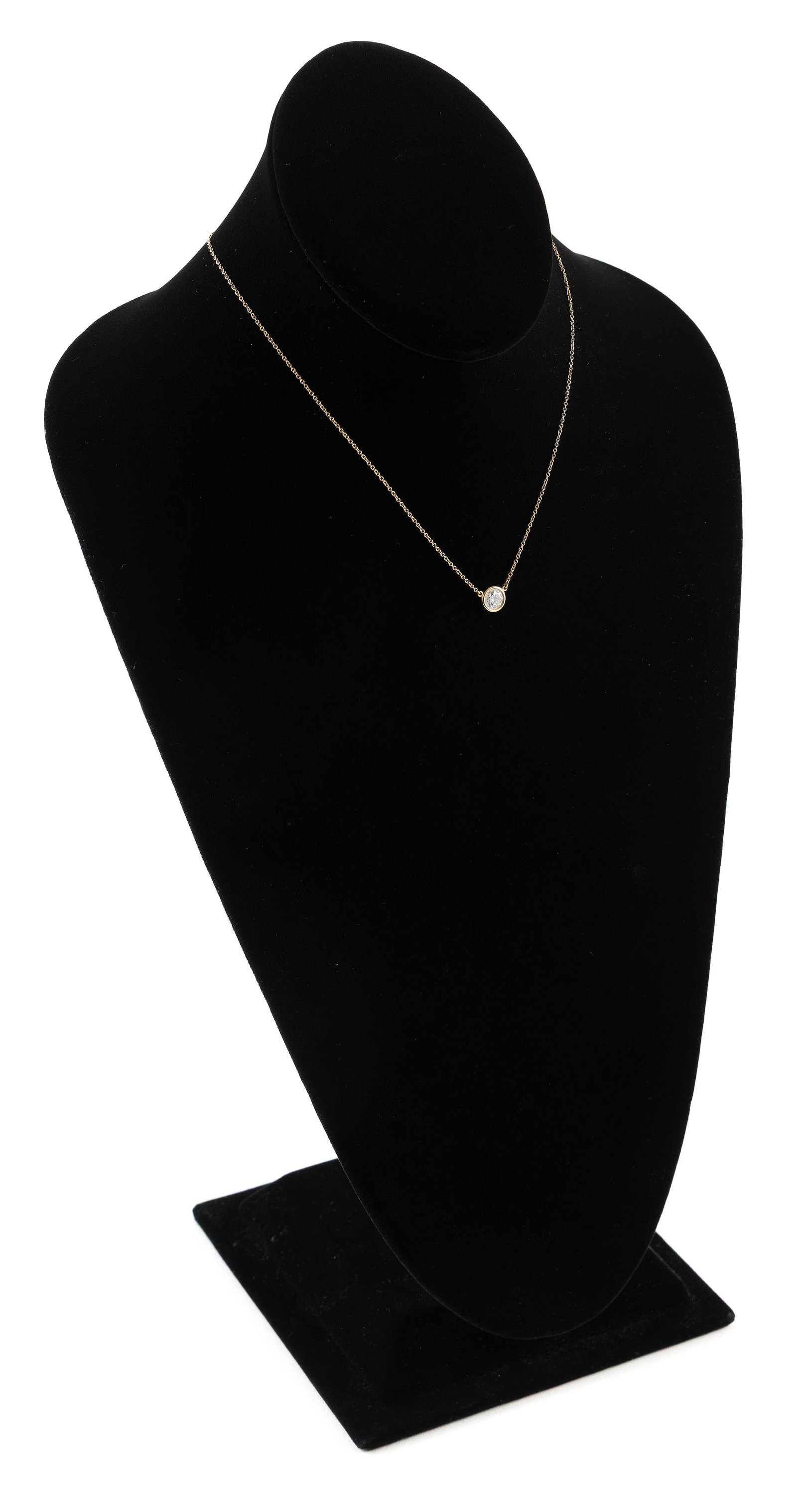 ELSA PERETTI FOR TIFFANY & CO. 18KT YELLOW GOLD AND DIAMOND PENDANT ON CHAIN Approx. 1.4 total dwt.: ELSA PERETTI FOR TIFFANY & CO. 18KT YELLOW GOLD AND DIAMOND PENDANT ON CHAIN One bezel-set round diamond, approx. 0.70 ct., approx. VVS2 clarity, G-H color. Stamped. Chain length 16" Approx. 1.4 total