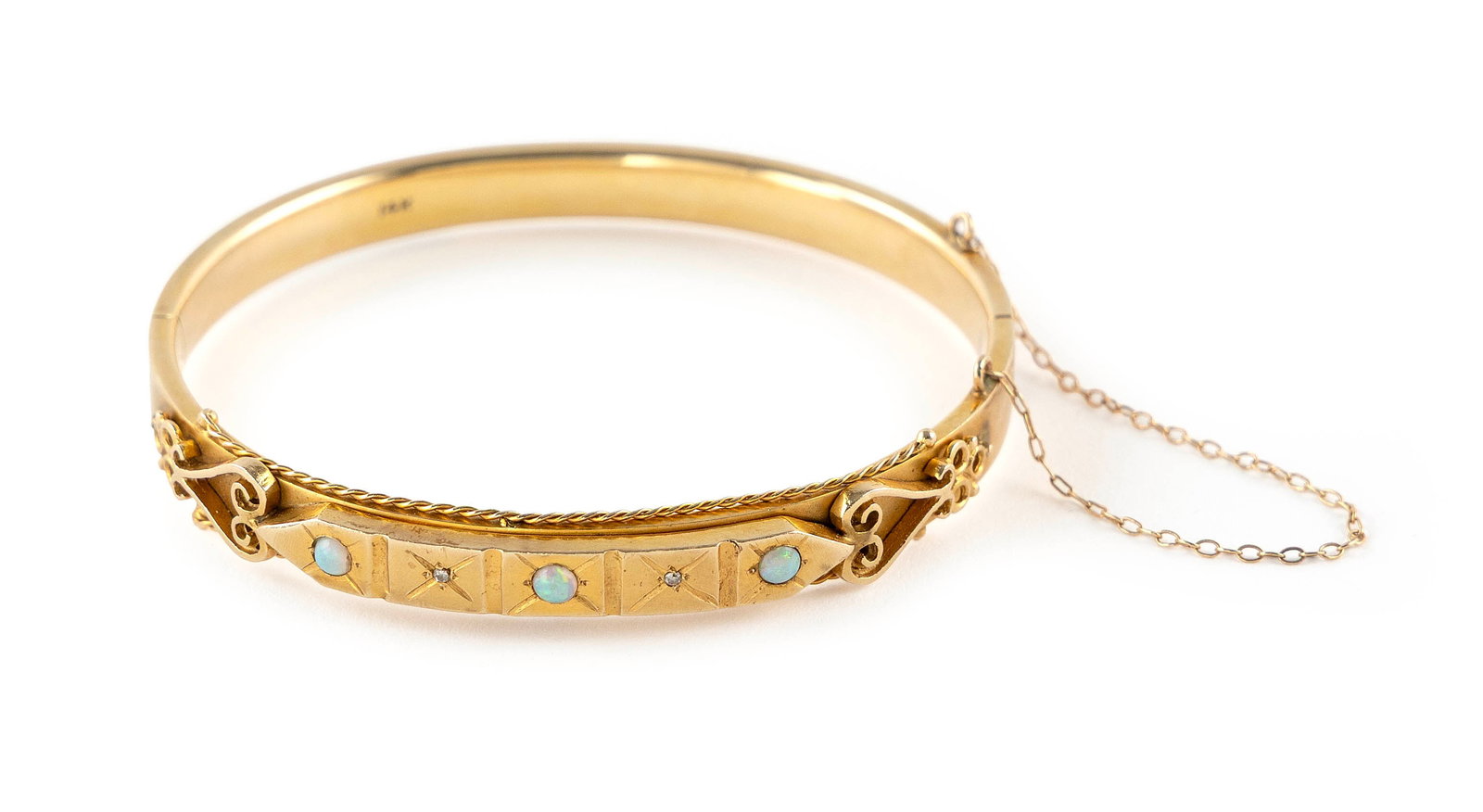 14KT YELLOW GOLD, OPAL AND DIAMOND BANGLE BRACELET Approx. 7.6 total dwt.: 14KT YELLOW GOLD, OPAL AND DIAMOND BANGLE BRACELET Three approx. 3.0mm round cabochon opals and two very small single-cut diamonds. Box clasp with safety chain. Stamped. Width approx. 8.0mm. Length 6.