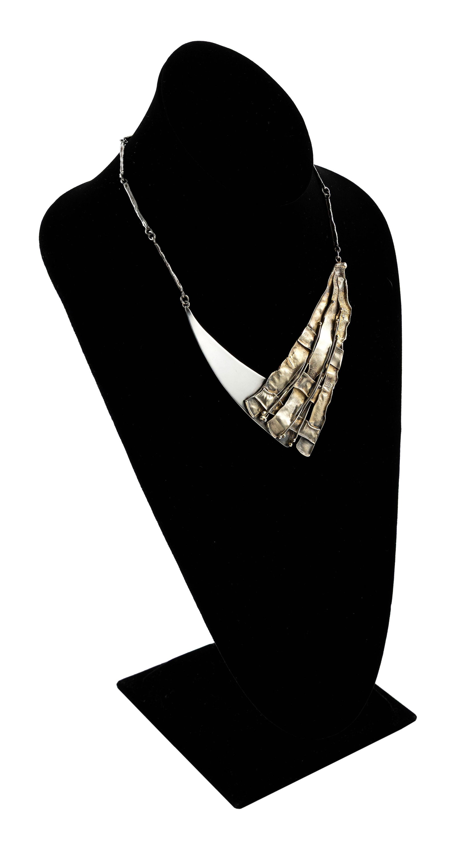 AVI SOFFER STERLING SILVER NECKLACE Approx. 29.1 total dwt.: AVI SOFFER STERLING SILVER NECKLACE Contemporary design "V" shaped bib. One side bright polished and the other side gold plated woven design. Bar link design chain approx. 6". Lobster claw clasp. Stam