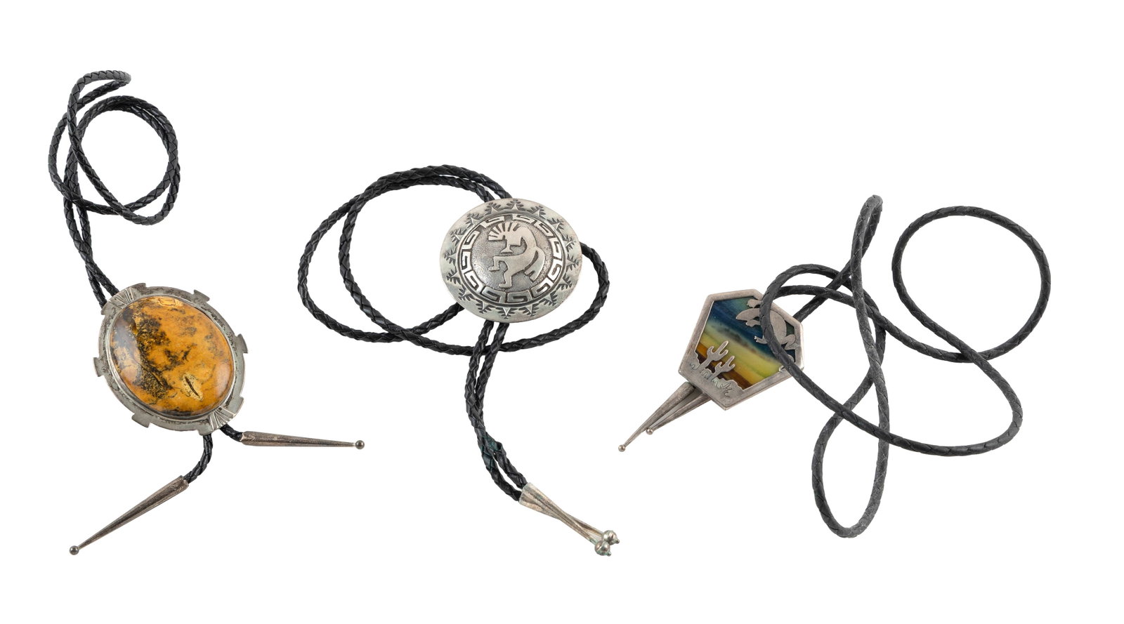 THREE NATIVE AMERICAN SILVER BOLO TIES Mid- to Late 20th Century