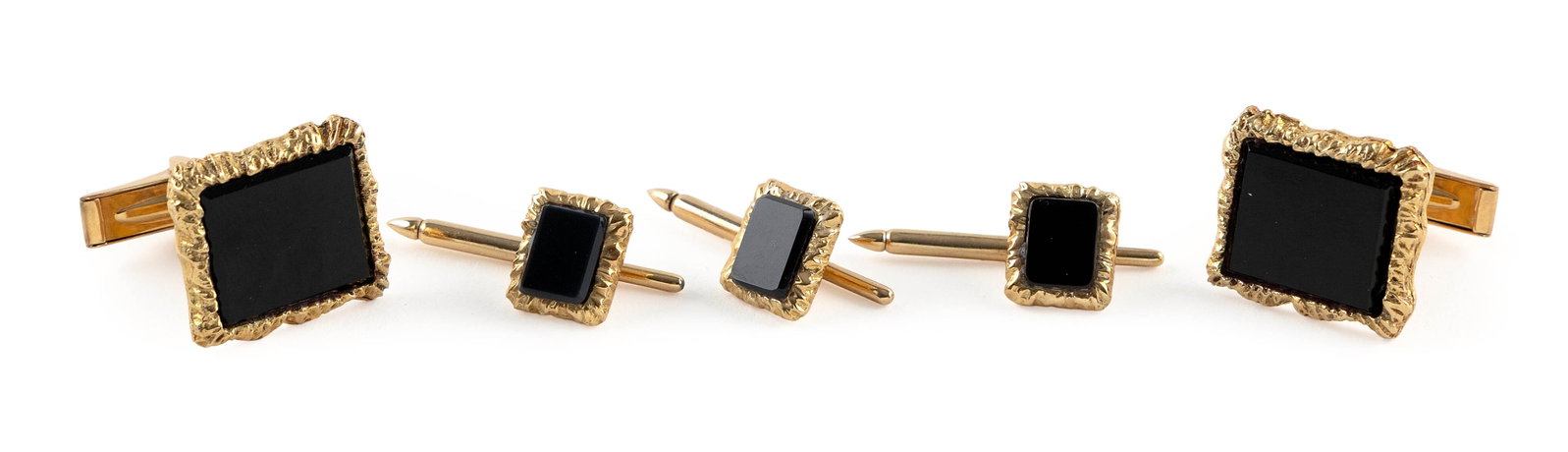 18KT YELLOW GOLD AND BLACK ONYX TUXEDO SET Approx. 14.5 total dwt.: 18KT YELLOW GOLD AND BLACK ONYX TUXEDO SET A pair of cufflinks with toggle backs, approx. 16.0 x 18.0mm, and three shirt studs with sliding pin backs, approx. 9.0 x 11.0mm. Stamped. Approx. 14.5 total