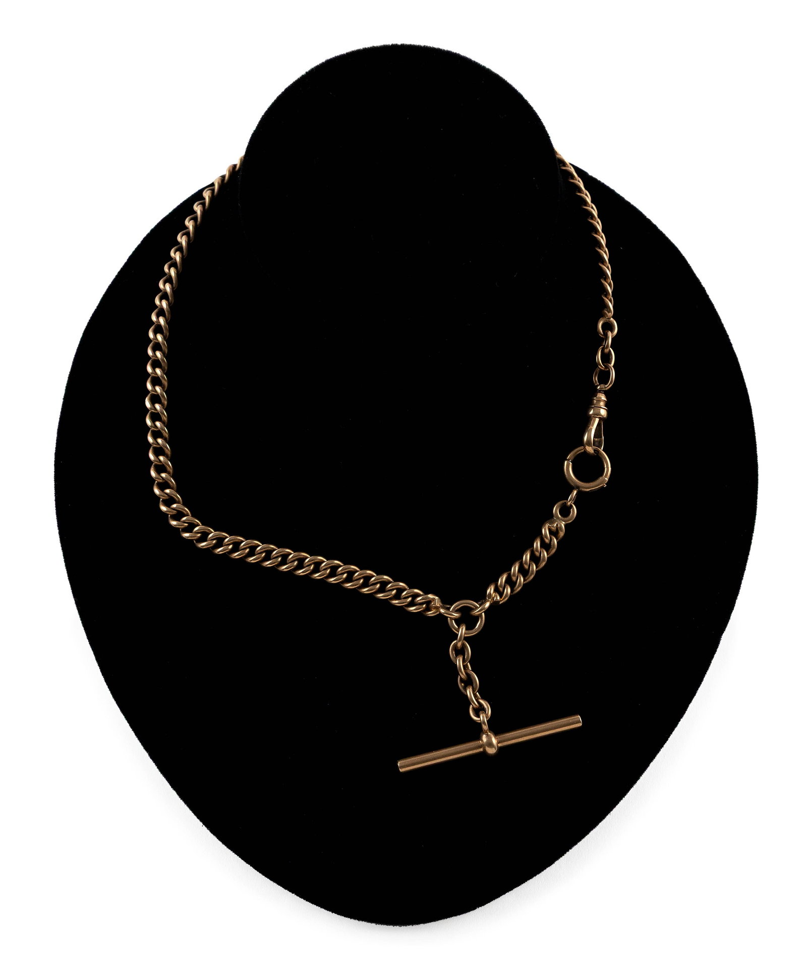 14KT YELLOW GOLD WATCH CHAIN Approx. 30.9 total dwt.: Y Y 14KT YELLOW GOLD WATCH CHAIN Curb style with swivel and spring ring. Width approx. 6.0mm. Length 15.5". Approx. 30.9 total dwt. **This item contains animal and/or plant material and is not availab