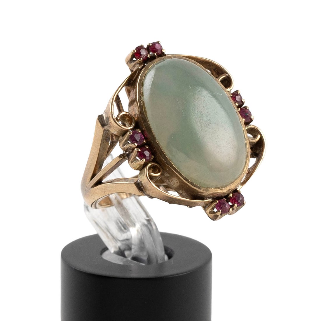 VINTAGE 18KT YELLOW GOLD, JADE AND RUBY RING Approx. 5.0 total dwt.: VINTAGE 18KT YELLOW GOLD, JADE AND RUBY RING One approx. 13.0 x 19.0mm cabochon jade and eight small round rubies. Stamped. Approx. 21.0 x 25.0mm. Size 5?. Approx. 5.0 total dwt.