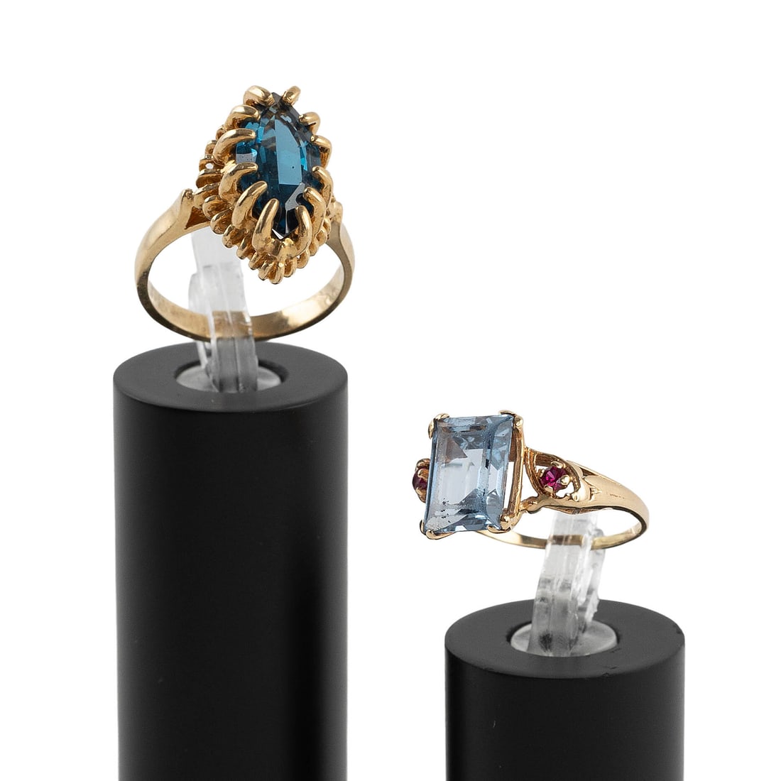 TWO 14KT YELLOW GOLD AND BLUE QUARTZ RINGS Approx. 4.9 total dwt.: TWO 14KT YELLOW GOLD AND BLUE QUARTZ RINGS 1) One approx. 7.0 x 14.0mm marquise-cut blue topaz. Approx. 14.0 x 19.0mm. Size 5?. 2) One approx. 8.0 x 10.0mm rectangular blue quartz and two small round-