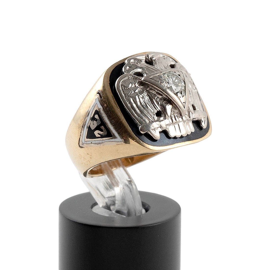 14KT WHITE AND YELLOW GOLD AND DIAMOND 32ND DEGREE RING Approx. 8.9 total dwt.: 14KT WHITE AND YELLOW GOLD AND DIAMOND 32ND DEGREE RING Top with a white gold double eagle emblem set with one approx. 0.20 ct round-cut diamond with a black enamel background. Sides with enamel emble