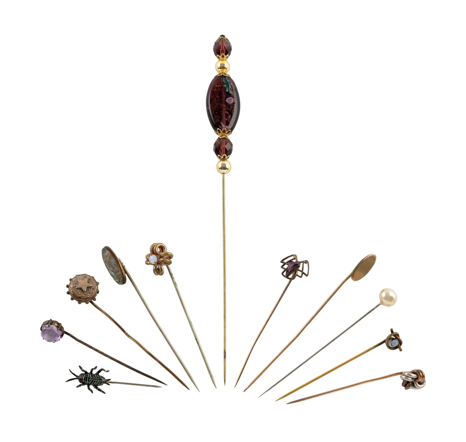 ELEVEN VINTAGE STICK PINS: ELEVEN VINTAGE STICK PINS Various stones and metals.