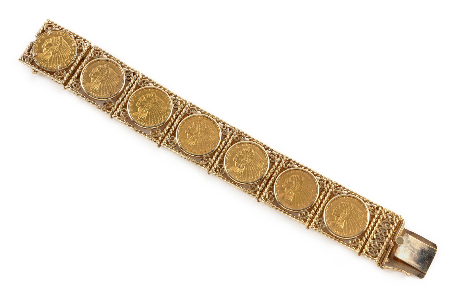 14KT YELLOW GOLD BRACELET WITH 2.5 DOLLAR GOLD COINS Approx. 52.5 total dwt.: 14KT YELLOW GOLD BRACELET WITH 2.5 DOLLAR GOLD COINS Seven flexible links each with a genuine 2.5 dollar coin dated 1911, 1913 and 1914. Box clasp with fold-over safety. Stamped. Width approx. 23.0mm.