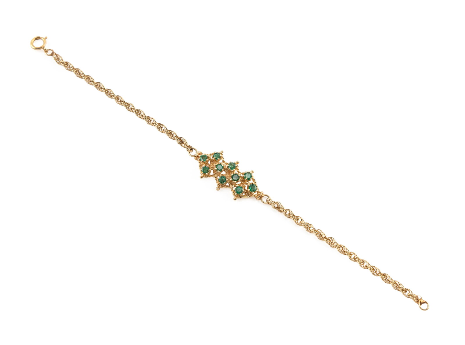 14KT YELLOW GOLD AND EMERALD BRACELET Approx. 3.7 total dwt.: 14KT YELLOW GOLD AND EMERALD BRACELET Ten small round-cut emeralds. Spring ring clasp. Stamped. Mounting approx. 14.0 x 37.0mm. Approx. 3.0mm rope chain. Length 7". Approx. 3.7 total dwt.
