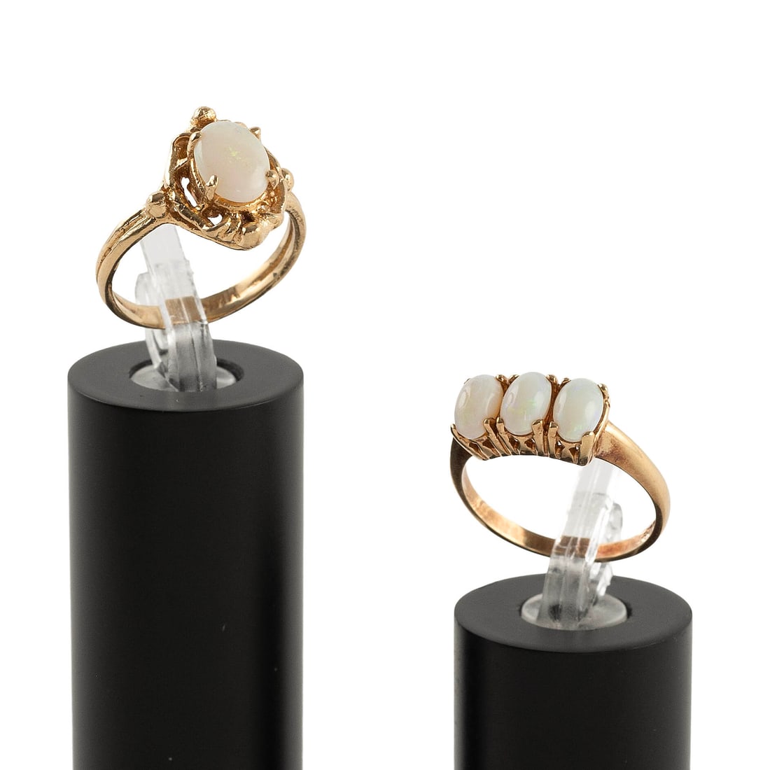 TWO 14KT YELLOW GOLD AND OPAL RINGS Approx. 3.5 total dwt.: TWO 14KT YELLOW GOLD AND OPAL RINGS 1) Three approx. 4.0 x 6.0mm oval cabochon opals. Size 6. 2) One approx. 6.0 x 8.0mm oval cabochon opal. Approx. 13.0 x 14.0mm. Size 5?. Both stamped. Approx. 3.5 t
