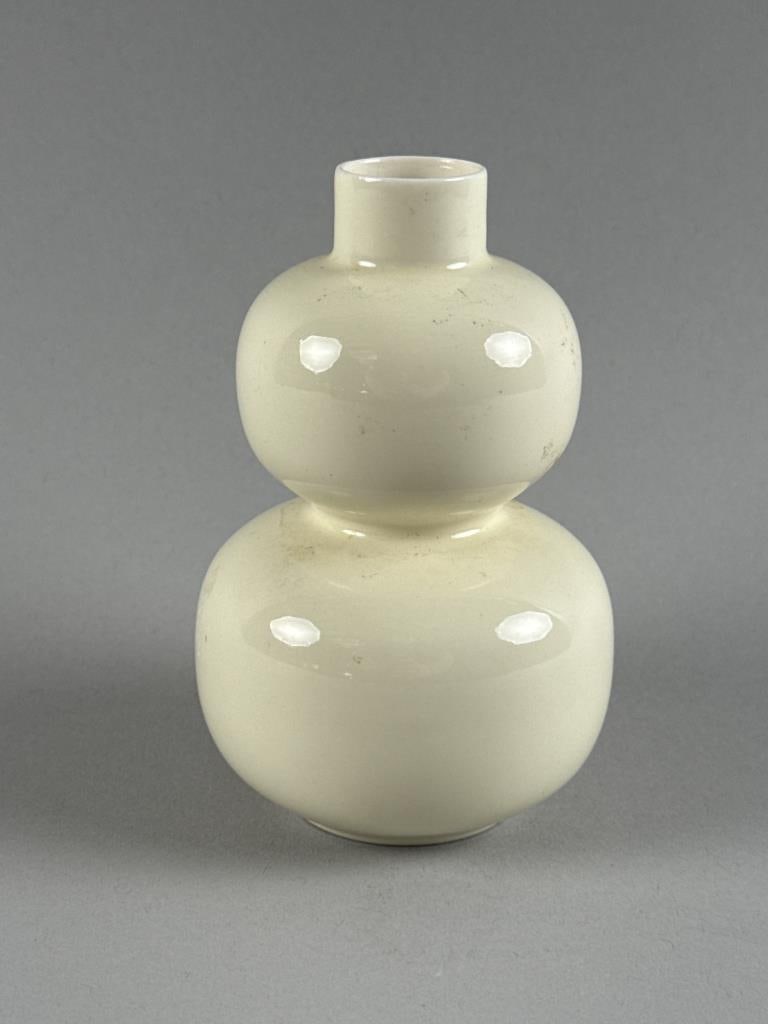 CHINESE MIDDLE KINGDOM WHITE PORCELAIN DOUBLE GOURD VASE 20th Century Height 5".: CHINESE MIDDLE KINGDOM WHITE PORCELAIN DOUBLE GOURD VASE 20th Century Character marks and "Bo Jia" on base. Height 5".