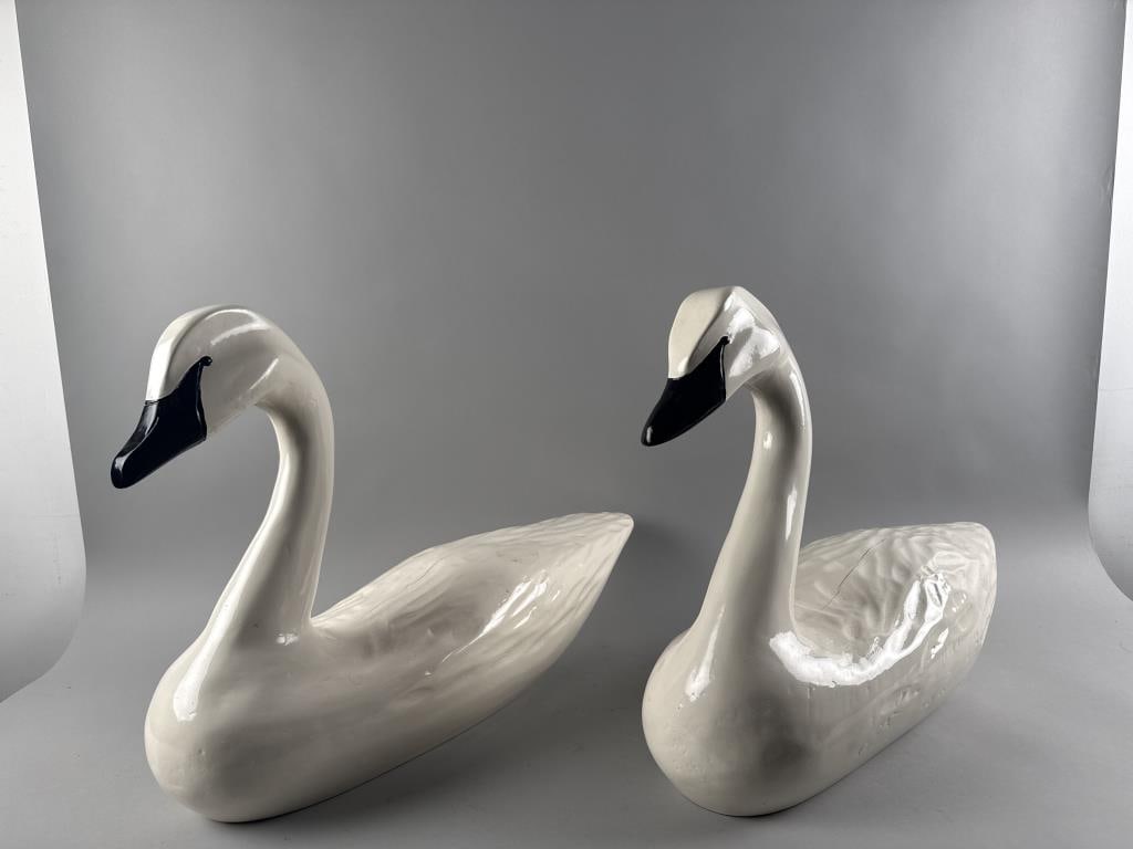PAIR OF CARVED AND PAINTED SWANS America, 20th Century Heights 16". Lengths 24". Depths 8". (1 of 3)