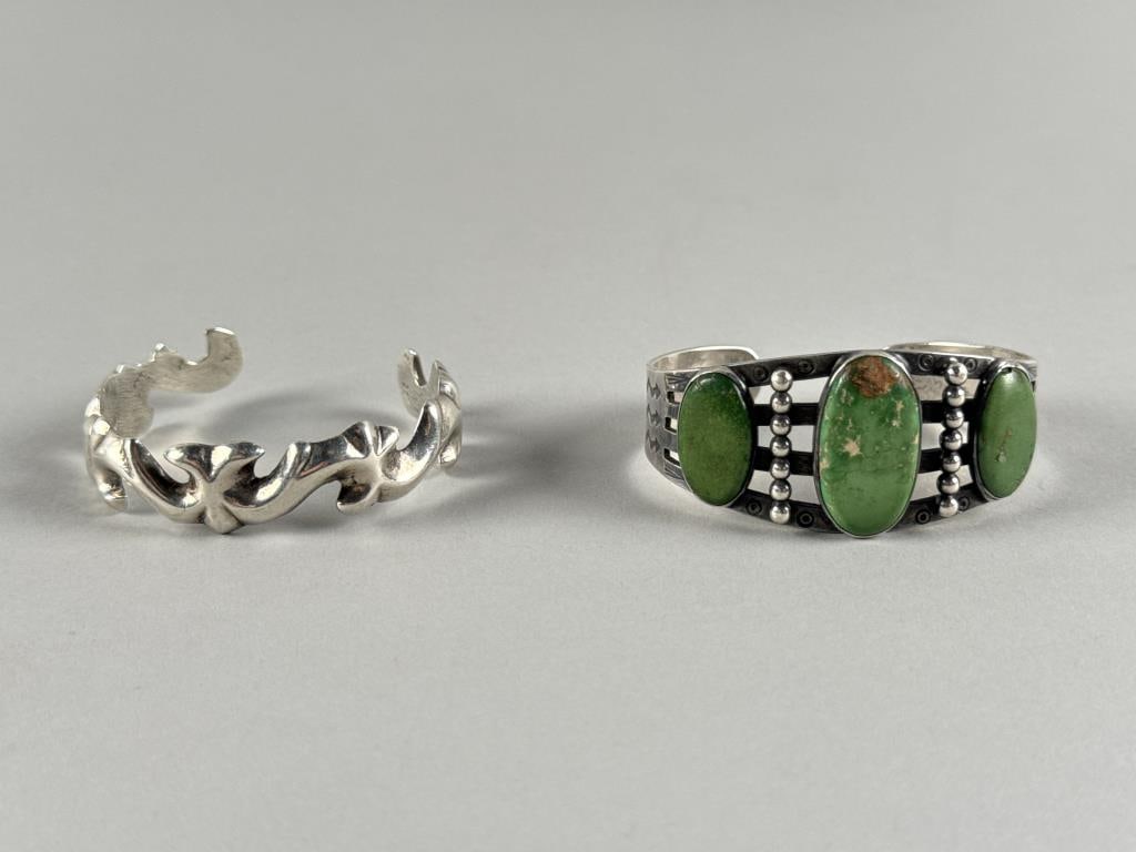 TWO NAVAJO SILVER AND TURQUOISE CUFF BRACELETS Mid-20th Century Approx. 63.0 grams. (1 of 4)