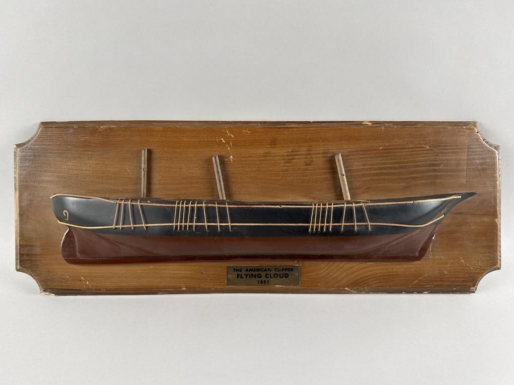 MOUNTED HALF HULL MODEL OF THE "FLYING CLOUD" 20th Century Height 9". Length 25".: MOUNTED HALF HULL MODEL OF THE "FLYING CLOUD" 20th Century Pine backboard. Height 9". Length 25".