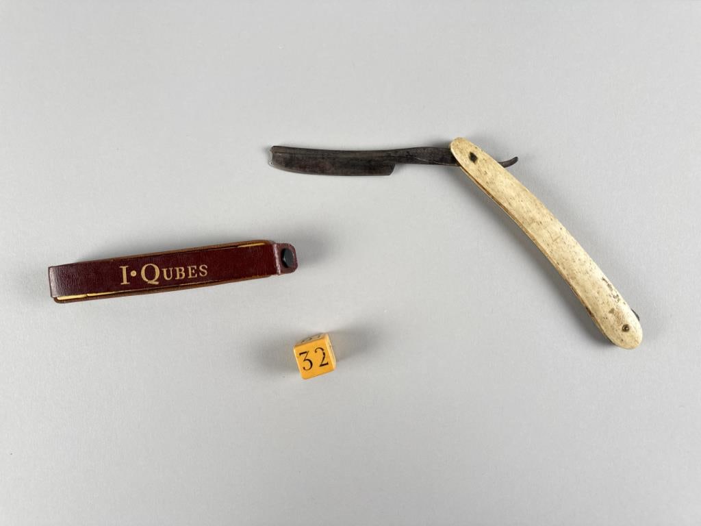 WHALEBONE-HANDLED STRAIGHT EDGE RAZOR AND AN "I. QUBES" CASED GAME SET Late 19th/Early 20th Century (1 of 3)