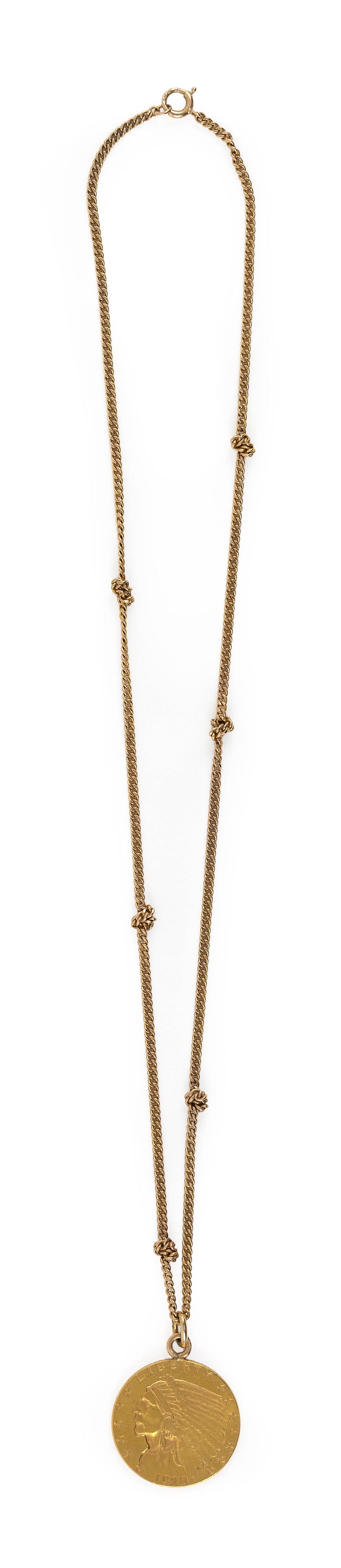 1928 U.S. $2_ INDIAN HEAD GOLD COIN ON A GOLD CHAIN Total approx. 4.4 dwt.: 1928 U.S. $2_ INDIAN HEAD GOLD COIN ON A GOLD CHAIN Ungraded but shows average surface wear from normal use. Loop attached to coin to suspend it from chain as a pendant. Total approx. 4.4 dwt.