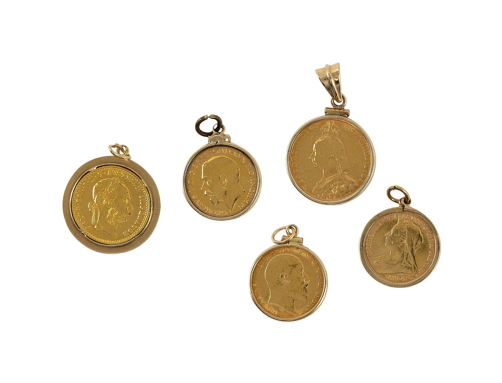 FIVE EUROPEAN BEZEL-SET GOLD COINS Total approx. 19.0 dwt.: FIVE EUROPEAN BEZEL-SET GOLD COINS English sovereigns from 1891, 1900, 1909 and 1911, and an Austrian 1-Ducat restrike. Total approx. 19.0 dwt.