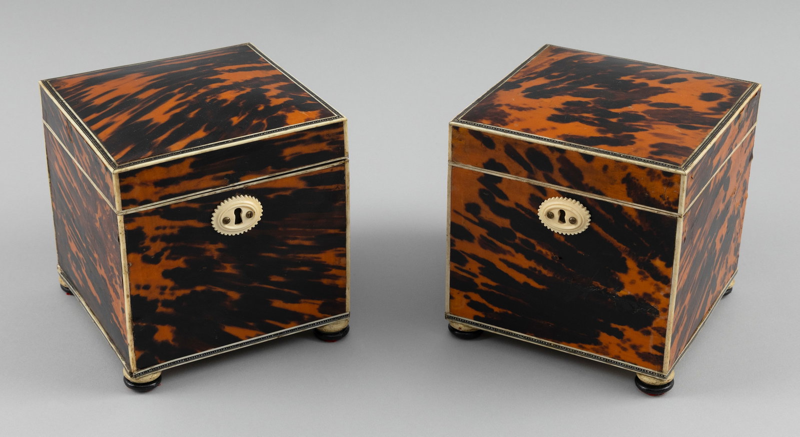 MATCHED PAIR OF ENGLISH SHELL TEA CADDIES Early 19th Century Heights 5.25". Widths 5". Depths 5.25". (1 of 4)
