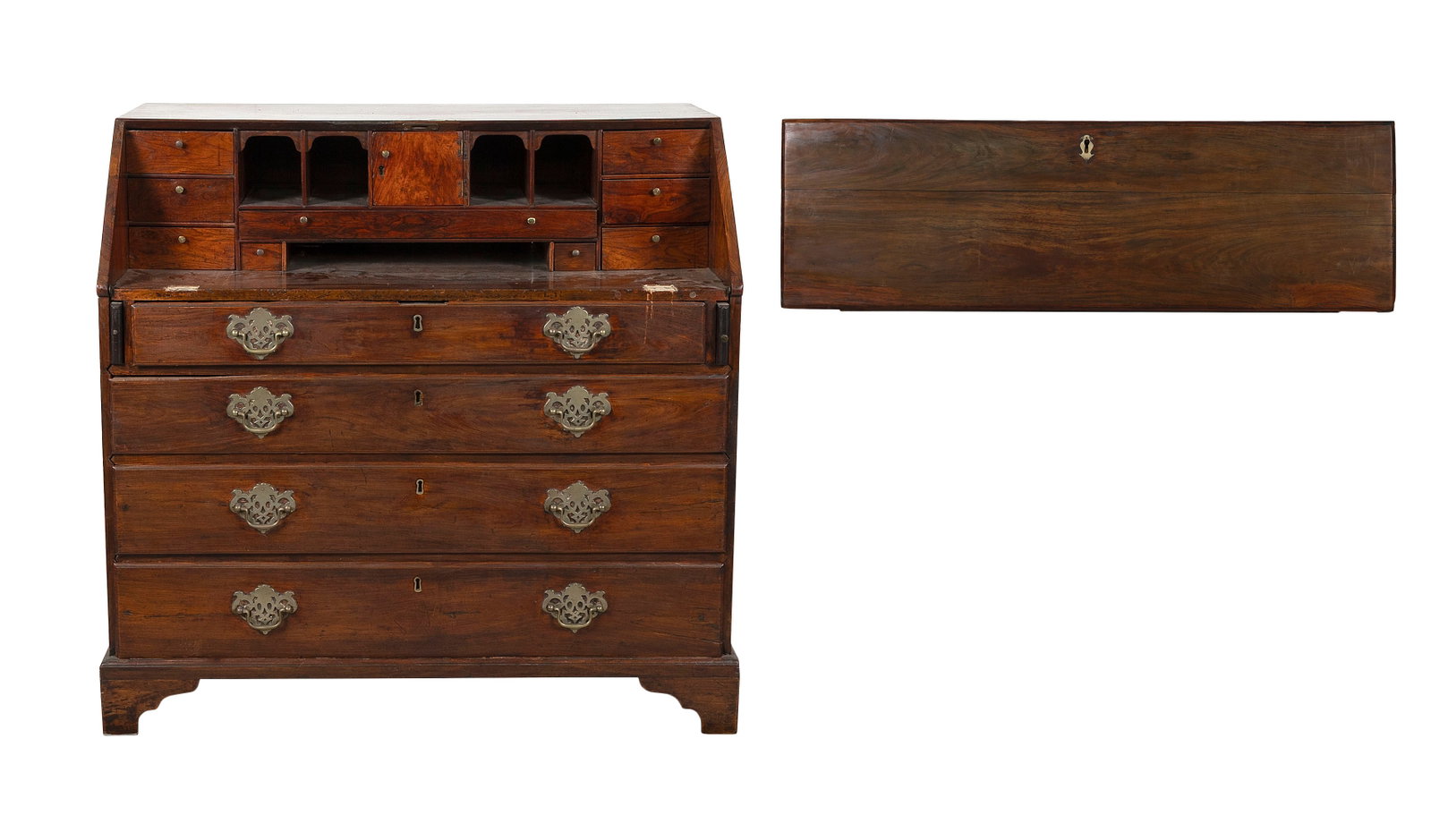 RARE CHINA TRADE ROSEWOOD SLANT-LID DESK 18th Century Height 41". Width 42". Depth 21".: RARE CHINA TRADE ROSEWOOD SLANT-LID DESK 18th Century Interior fitted with pigeonholes and drawers. Case with four graduated full-width drawers and a bracket base. Silver metal pierced Chippendale pul