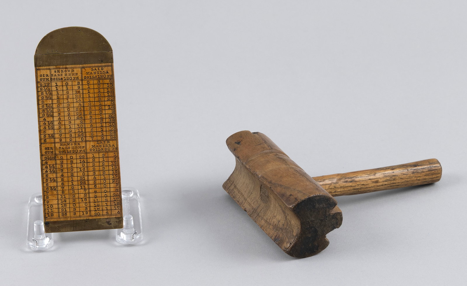ROPE GAUGE AND A LINE SERVING MALLET 19th/Early 20th Century: ROPE GAUGE AND A LINE SERVING MALLET 19th/Early 20th Century 1) Boxwood and brass rope gauge by John Redbone & Sons, Birmingham. Used to determine rope diameter, weight and strength, with tables on bo