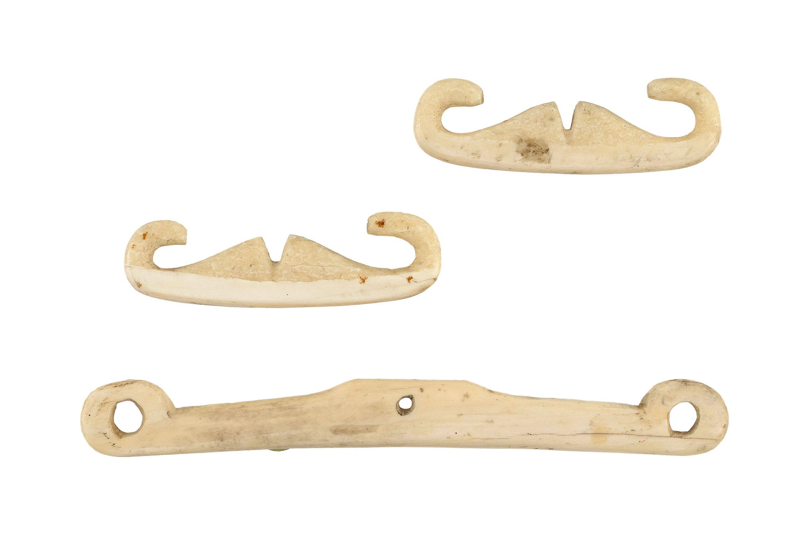 THREE WALRUS IVORY ROPE TIGHTENERS Second Half of the 19th Century Lengths from 4.5" to 9.75". (1 of 2)