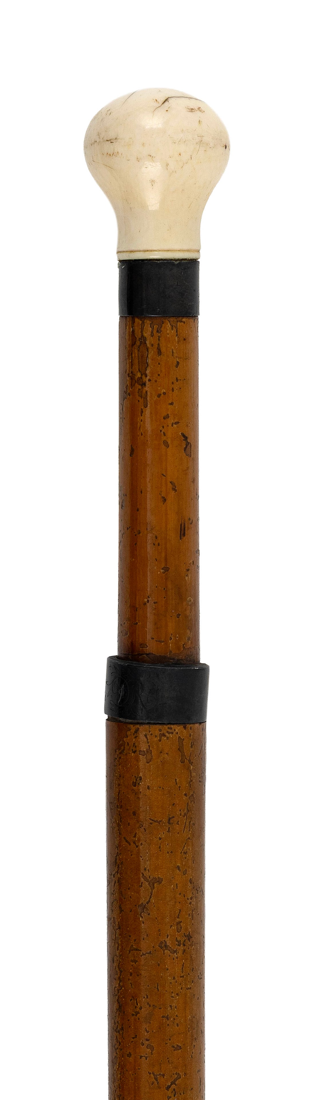 CANE WITH WHALE IVORY BALL HANDLE 19th Century Length 35.5".: CANE WITH WHALE IVORY BALL HANDLE 19th Century Wood shaft with brass ferrule. Length 35.5".
