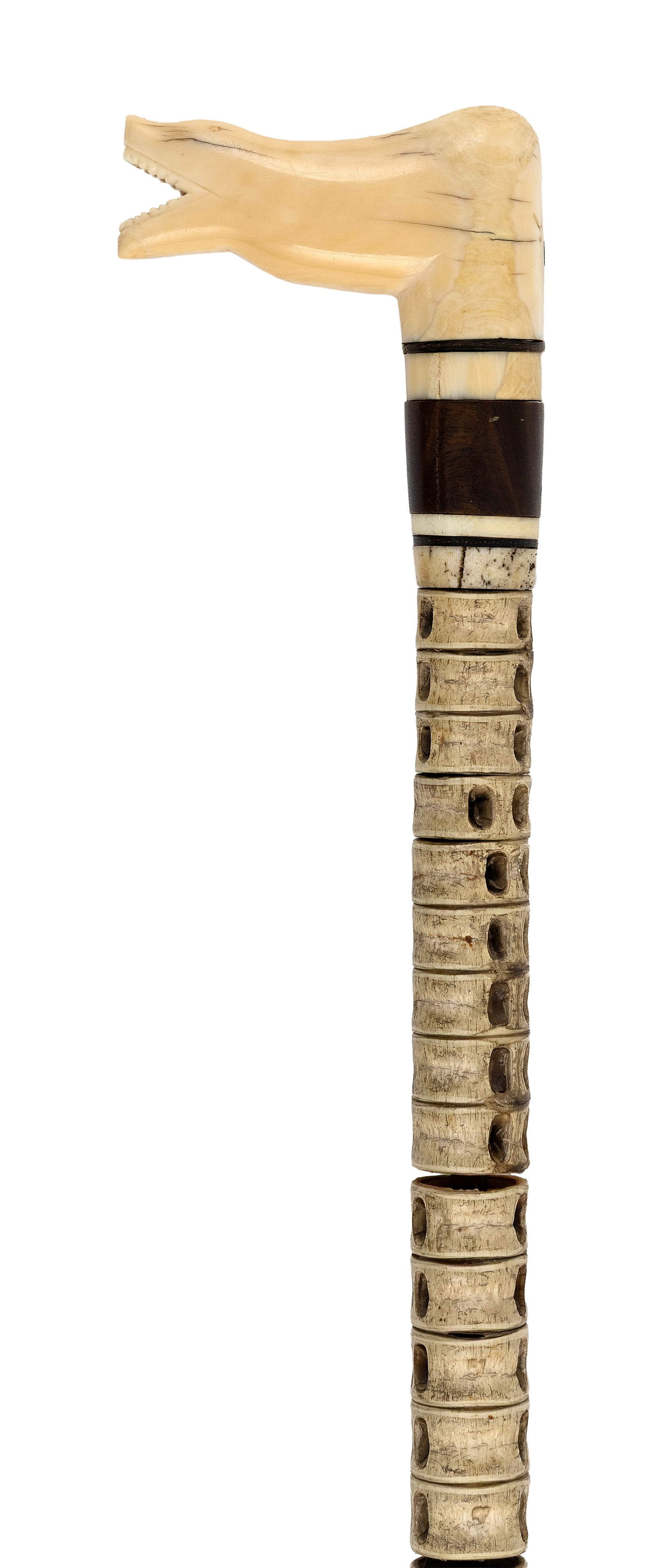 CANE WITH ANIMALISTIC HANDLE Late 19th Century Length 33.5".: CANE WITH ANIMALISTIC HANDLE Late 19th Century Whale ivory handle resembles a polar bear. Vertebrae shaft with whalebone ferrule. Length 33.5".