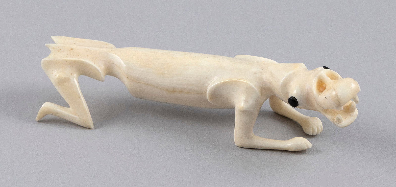 INUIT CARVED IVORY TUPILAK Greenland, 20th Century Length 5". (1 of 5)