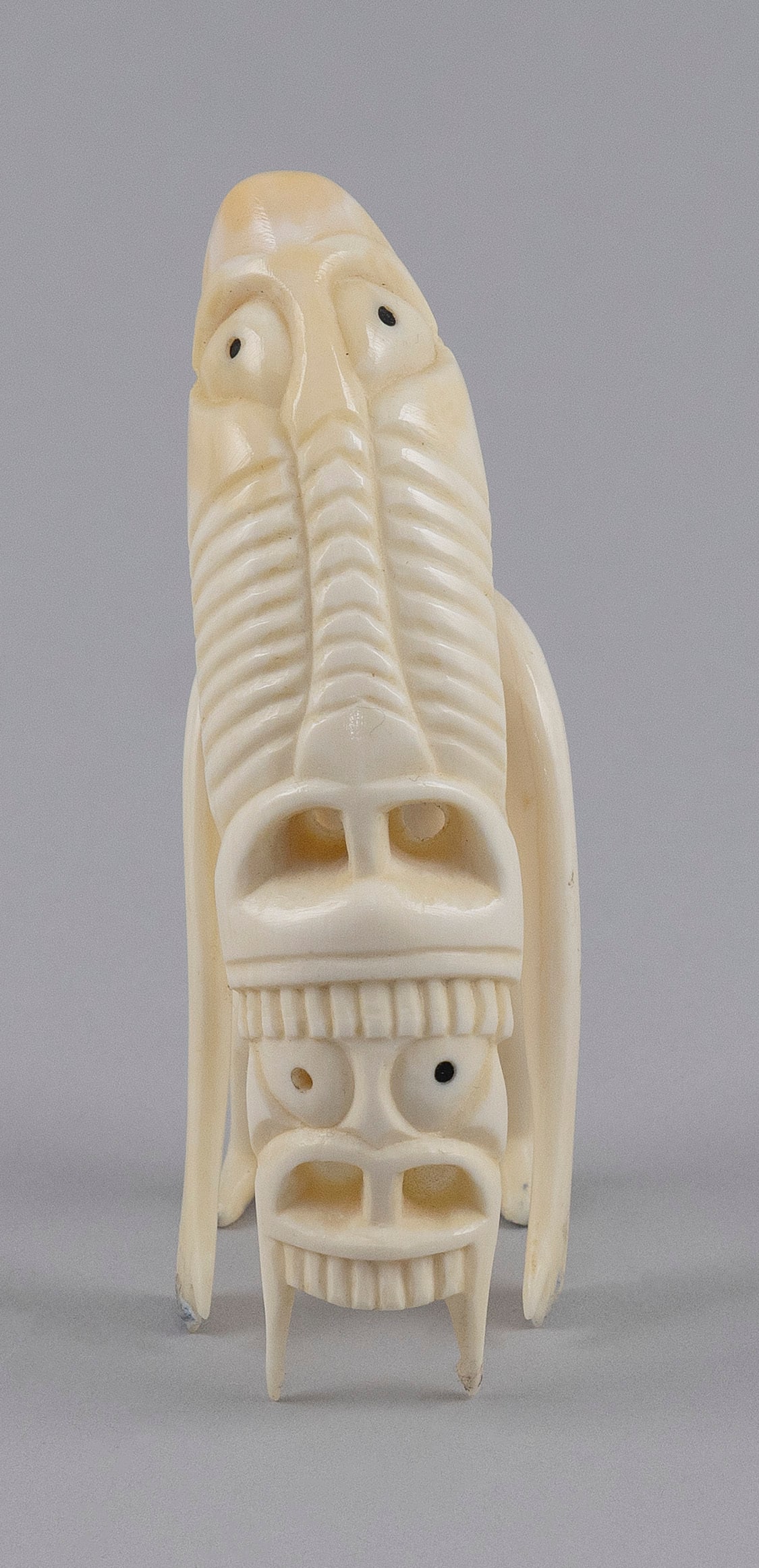 INUIT CARVED IVORY TUPILAK Greenland, First Half of the 20th Century Height 4.25". (1 of 5)