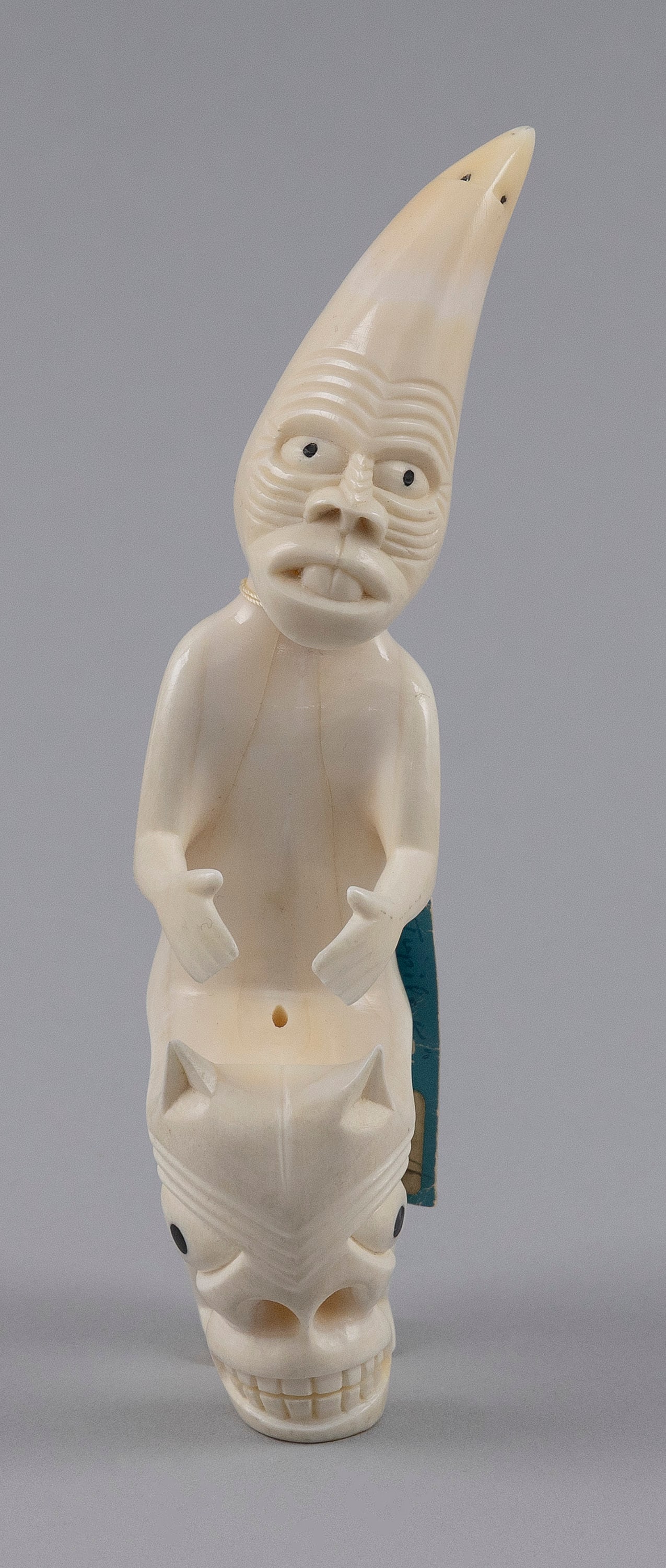 CARVED WALRUS IVORY TUPILAK, PROBABLY INUIT 20th Century Height 5.75".: Y Y CARVED WALRUS IVORY TUPILAK, PROBABLY INUIT 20th Century Height 5.75". **This item contains animal and/or plant material and is not available for international delivery without CITES and other nec