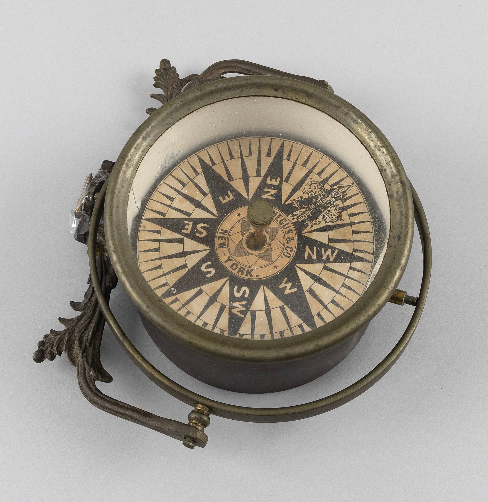 T.S. NEGUS BRASS TELLTALE COMPASS WITH MOUNTS 19th Century Maximum diameter 8". Height with brackets (1 of 2)