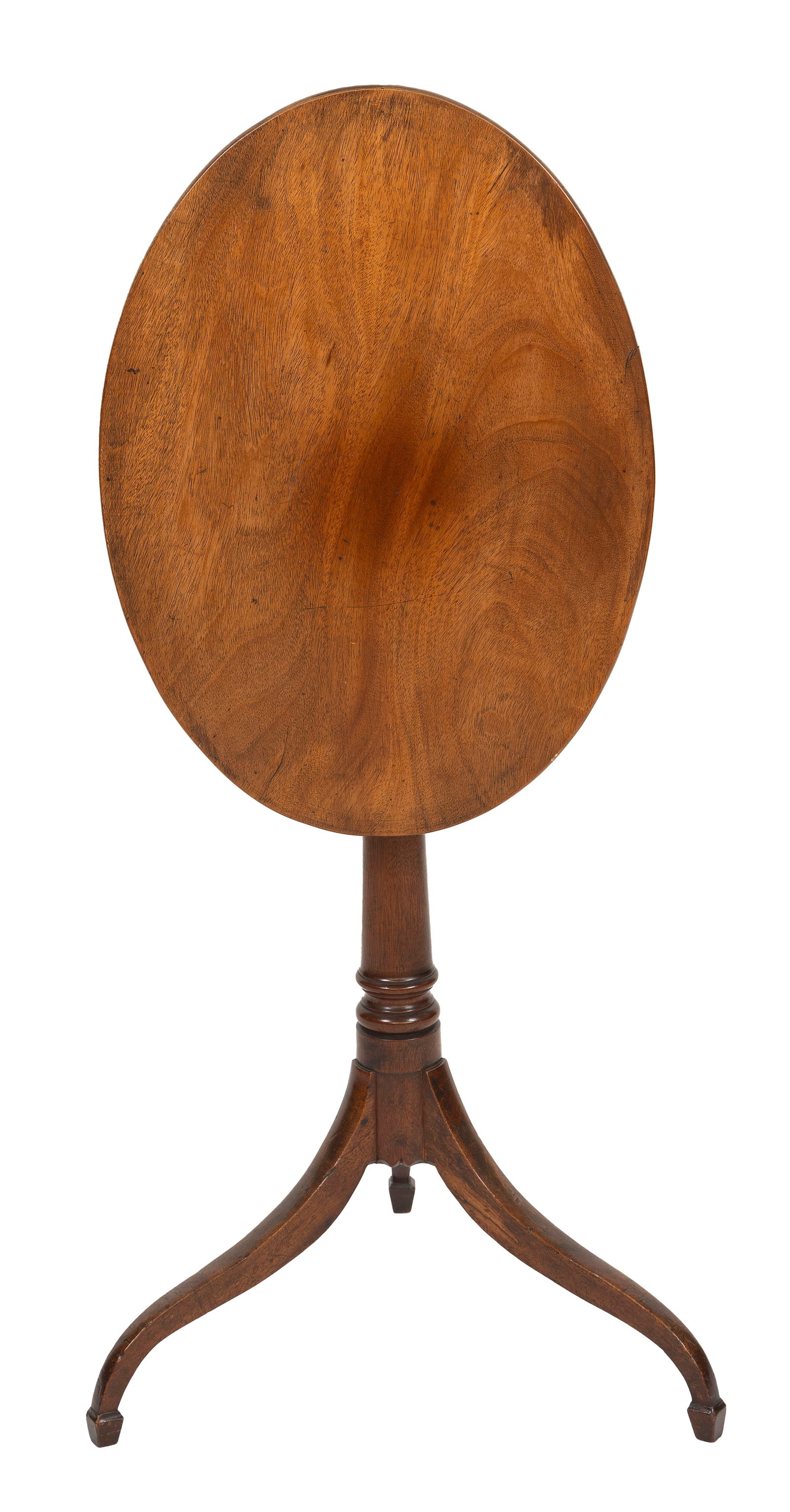 MAHOGANY TILT-TOP CANDLESTAND First Quarter of the 19th Century Height 28.5". Oval top 22.25" x 16". (1 of 3)