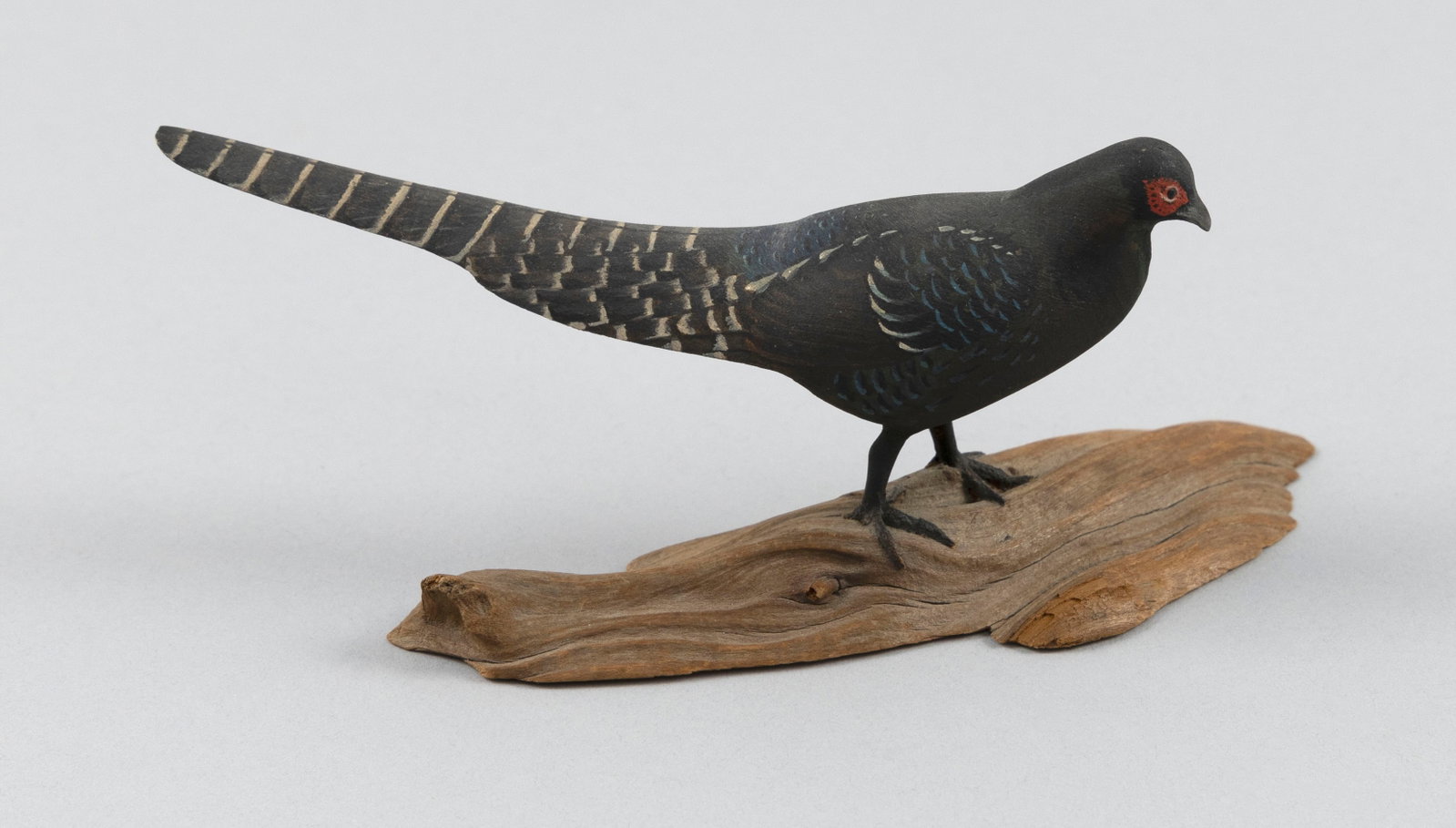 HAROLD NELSON GIBBS MINIATURE BLACK PHEASANT Barrington, Rhode Island, 1866-1970 Length 6".: HAROLD NELSON GIBBS MINIATURE BLACK PHEASANT Barrington, Rhode Island, 1866-1970 Mounted on a driftwood base. Signed and dated on underside of base "HG 1948". Length 6".