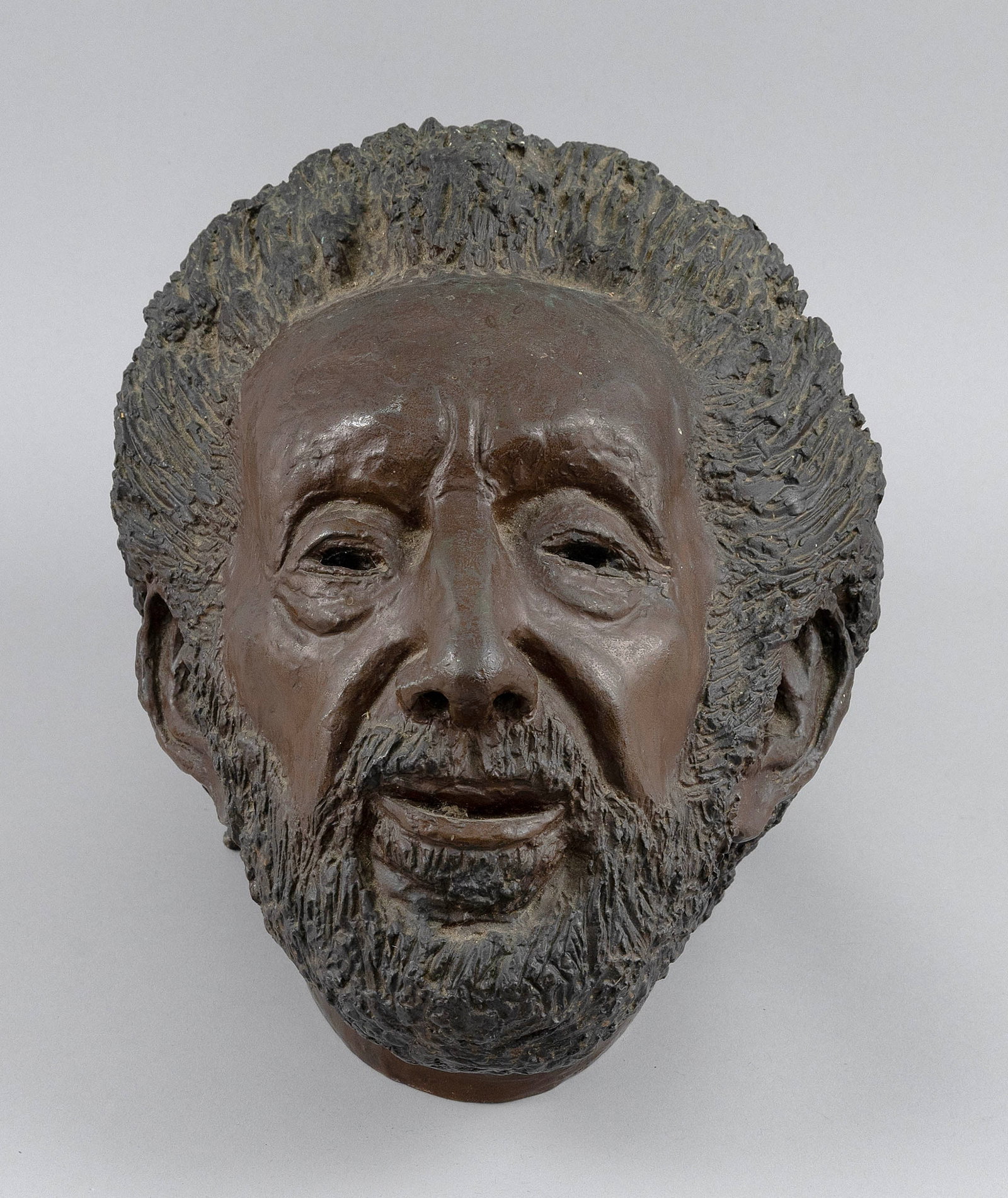 BARBARA BERETICH (California/Illinois/Europe, 1936-2018), Head of a man., Bronze, height 11".: BARBARA BERETICH California/Illinois/Europe, 1936-2018 Head of a man. Signed and dated illegibly and foundry mark on base. Bronze, height 11".