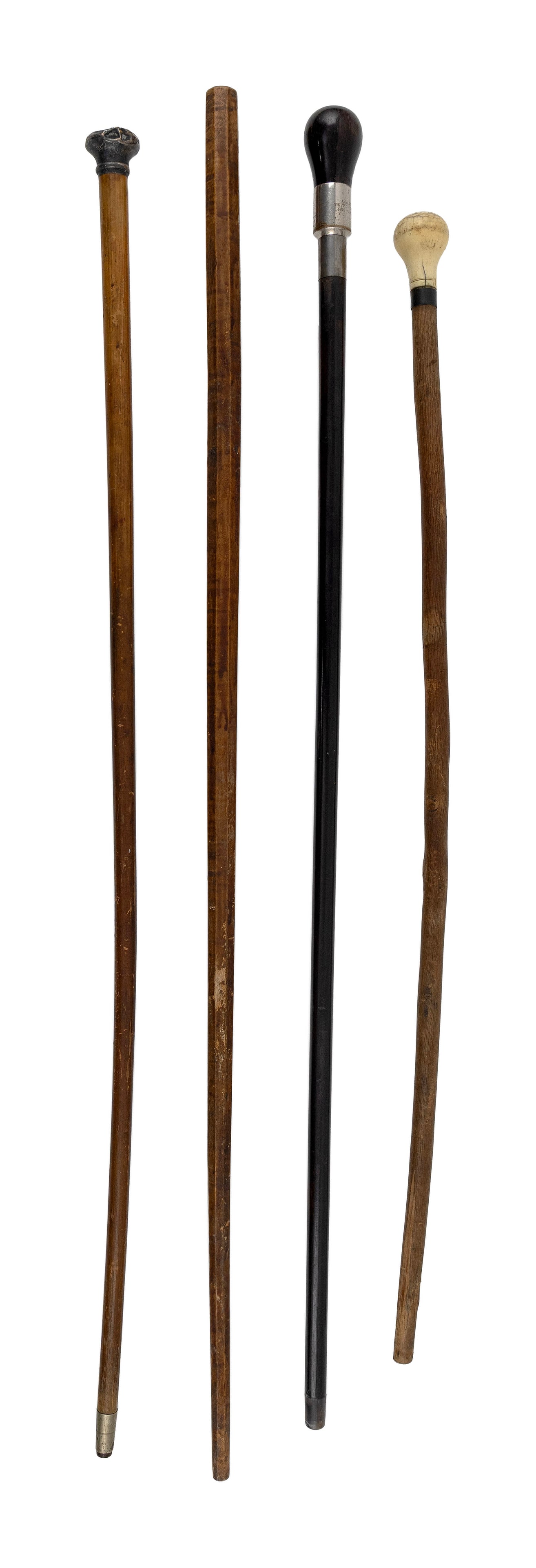 FOUR SIGNED CANES 19th Century Lengths to approx. 35".: FOUR SIGNED CANES 19th Century One marked "Palestine Temple Prod. RI / Buffalo", one tiger maple with diamond-shaped inlay, and one engraved on collar "Britton & Sons Stoughton Mass". Lengths to appro