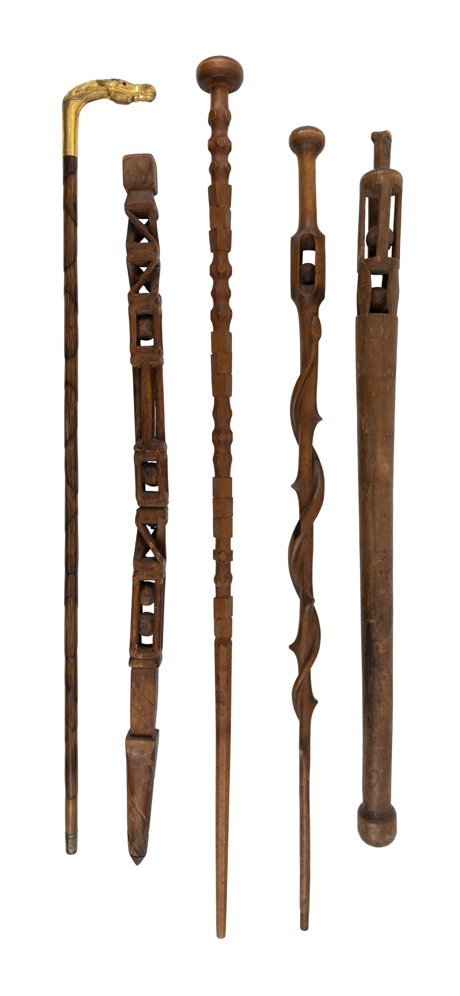 FIVE CARVED WOODEN CANES Late 19th/Early 20th Century Lengths from 35.75" to 40". (1 of 1)