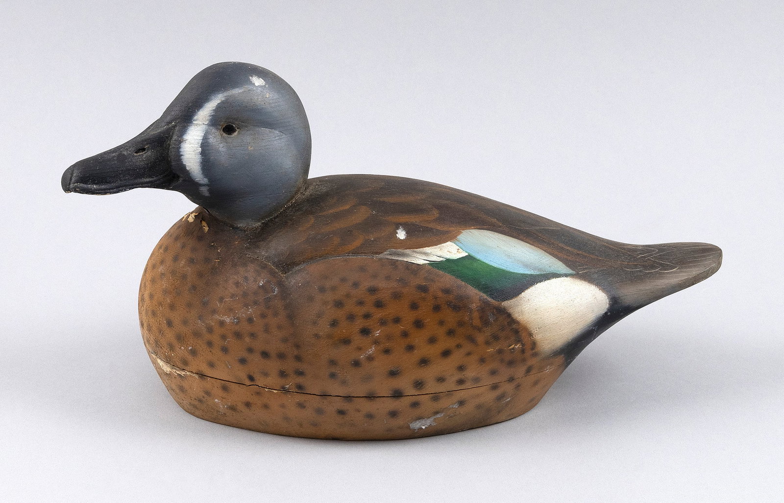 TIM LONG BLUE-WINGED TEAL DRAKE DECOY New Hampshire, 20th Century Length 11.5".: TIM LONG BLUE-WINGED TEAL DRAKE DECOY New Hampshire, 20th Century Glass eyes. Length 11.5".
