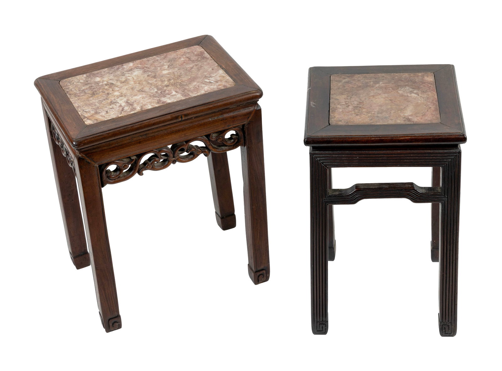 TWO CHINESE CARVED HARDWOOD STANDS WITH INSET ROUGE MARBLE TOPS Late 19th Century Heights 20.5".: TWO CHINESE CARVED HARDWOOD STANDS WITH INSET ROUGE MARBLE TOPS Late 19th Century One with reeded apron, legs and stretcher. Other with an open-carved apron in a ruyi design. Heights 20.5". Tops 12" x