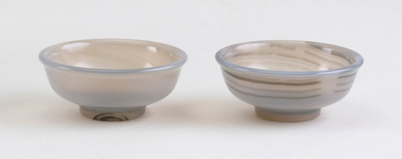 PAIR OF SMOKEY BANDED AGATE WINE CUPS Heights 1". Diameters 2.25". (1 of 2)