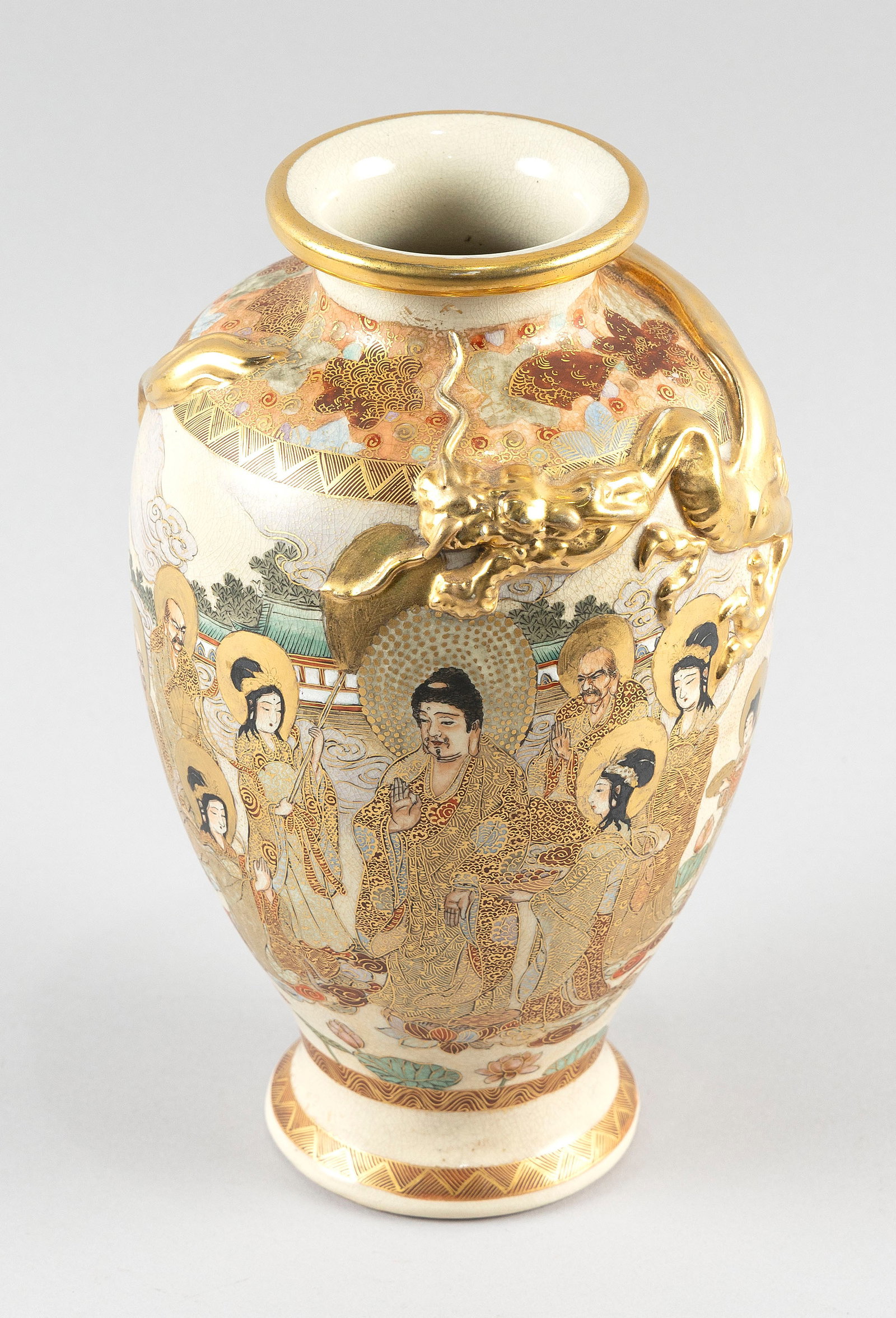 JAPANESE SATSUMA POTTERY VASE 19th Century Height 10".: JAPANESE SATSUMA POTTERY VASE 19th Century Decoration of Buddha, seven Rakan and other figures against a detailed landscape ground. Raised gilt dragon at shoulder. Signed "Kitosai" on base. Height 10"