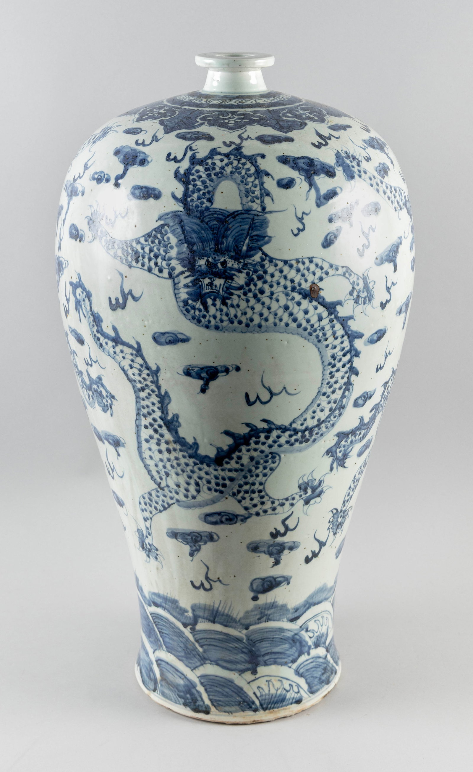 CHINESE BLUE AND WHITE PORCELAIN MEIPING VASE 19th/20th Century Height 27".: CHINESE BLUE AND WHITE PORCELAIN MEIPING VASE 19th/20th Century Decoration of dragons and fiery pearls against a cloud-filled ground. Height 27". Provenance: Port Chester, New York estate.