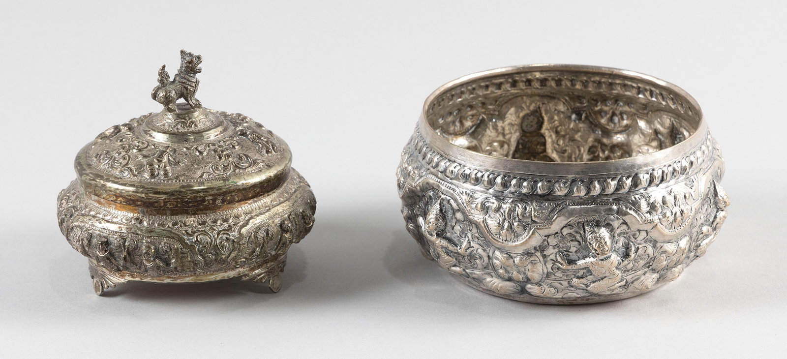TWO SOUTHEAST ASIAN REPOUSSE SILVER TABLEWARES Late 19th/Early 20th Century Approx. 298 grams. (1 of 4)