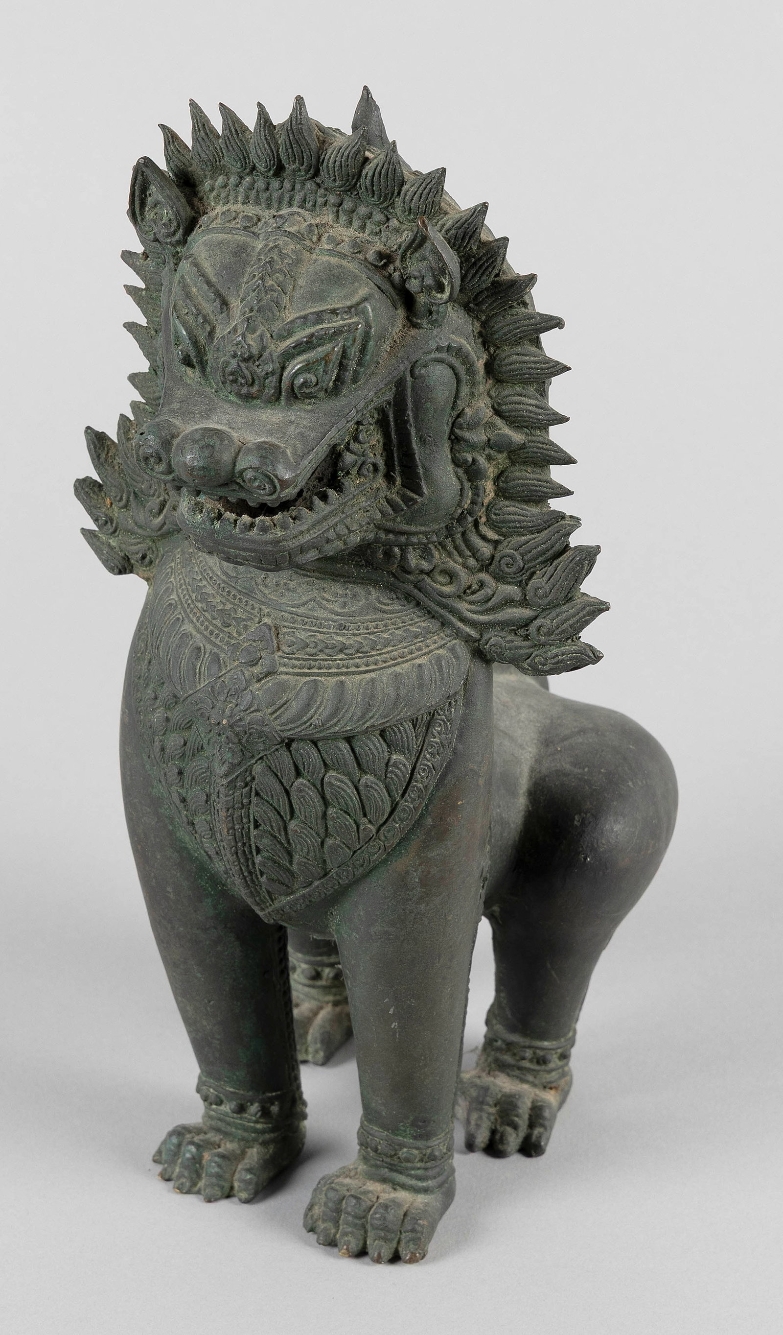 THAI BRONZE GUARDIAN LION (SINGHA) 20th Century Height 11".: THAI BRONZE GUARDIAN LION (SINGHA) 20th Century With a fierce expression. Height 11".