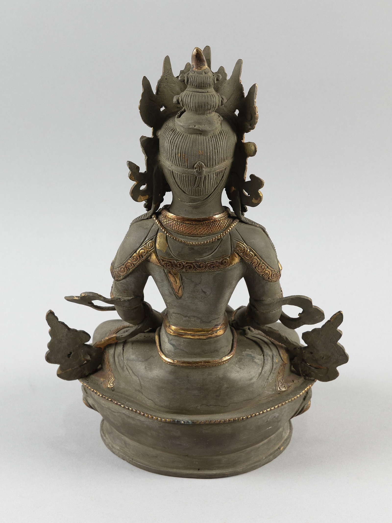 TIBETAN MIXED METAL FIGURE OF AMITAYUS 19th Century Height 13".: TIBETAN MIXED METAL FIGURE OF AMITAYUS 19th Century Seated in a meditative posture on a lotus base and holding her vase or kalasha. Height 13".