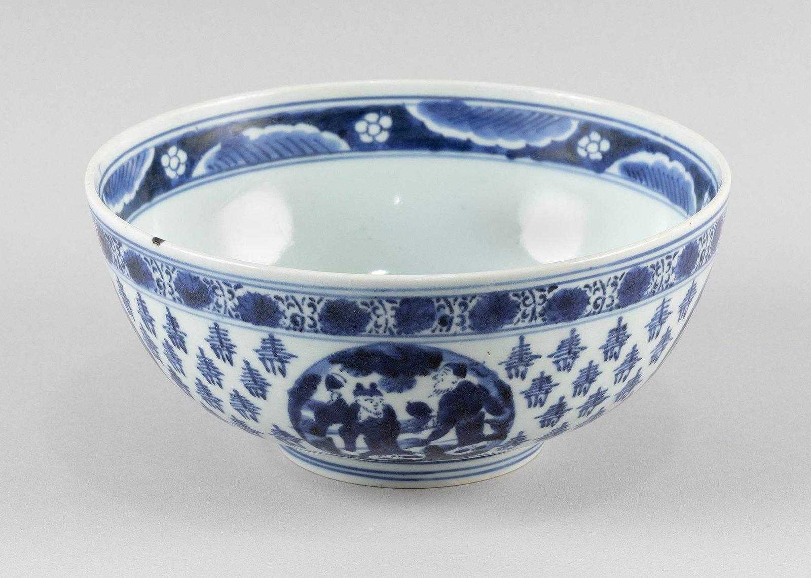 CHINESE BLUE AND WHITE PORCELAIN BOWL 20th Century Height 4.5". Diameter 8.5". With fitted box.: CHINESE BLUE AND WHITE PORCELAIN BOWL 20th Century Interior rondel depicts a deity riding a crane. Exterior with figural rondels against a calligraphic ground. Six-character Chenghua mark on base. Hei