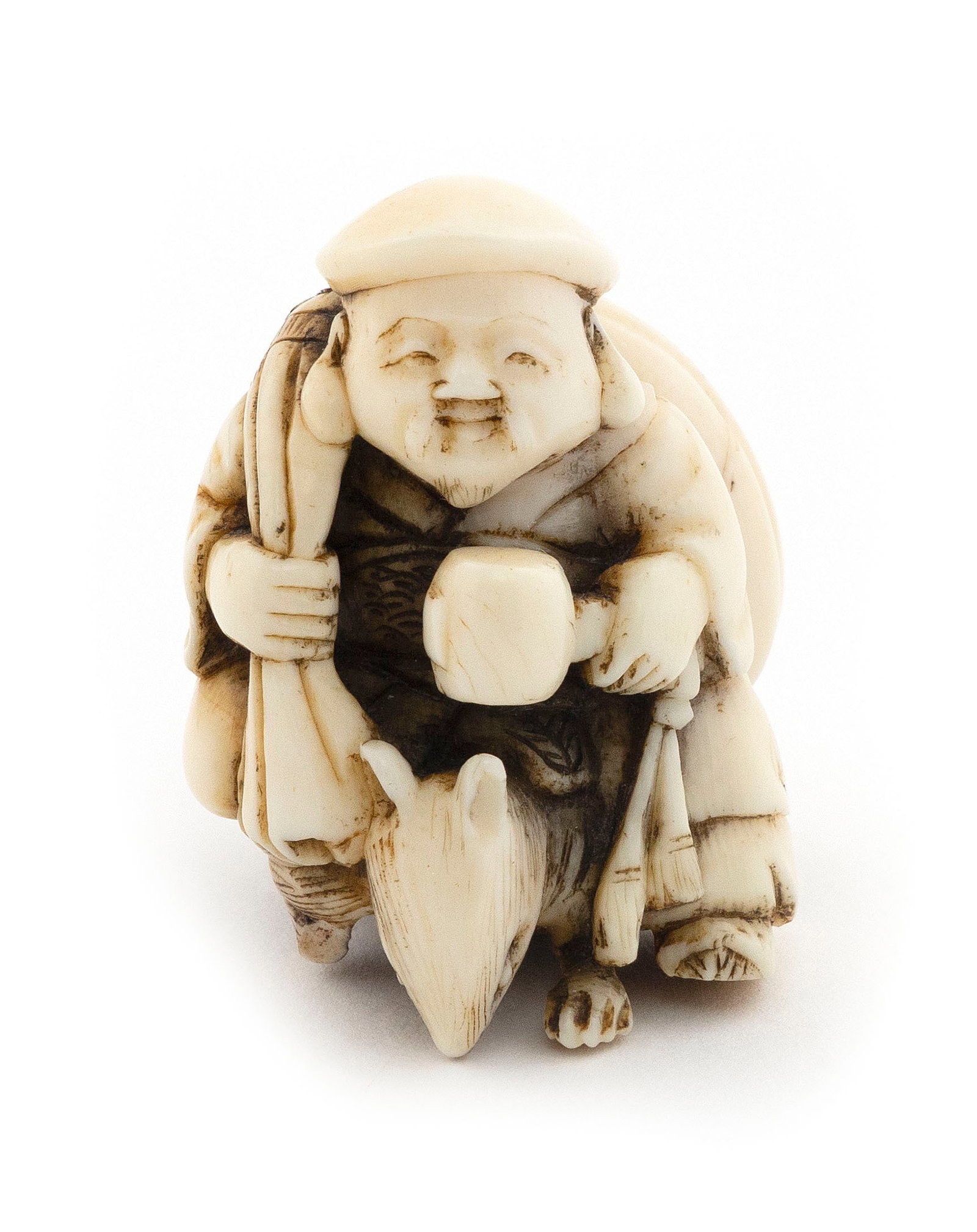 JAPANESE CARVED IVORY NETSUKE BY MASAKI Late 19th Century Height 1.75".: JAPANESE CARVED IVORY NETSUKE BY MASAKI Late 19th Century Daikoku sitting on top of a rat and holding his hammer and sack. Signed in inset red lacquer plaque. Height 1.75". Provenance: Private South C