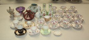 Porcelain Lot: Rosenthal Limoges Dresden: Large group lot of porcelain including a Dresden covered jar w/putti, Rosenthal Raymond Peynet Vase, Austrian portrait vase, Bernardaud Limoges vase, 2 German perfume bottles, 12 demitasse cups & sauc