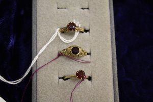 3 14/10kt Gold Victorian/Edwardian Garnet Rings: Three Victorian/Edwardian era gold garnet rings. 10kt rose gold, inscribed 1912 size 6 1/4, 14kt yellow gold w/filigree size 6 1/4 & 14kt yellow gold size 5. 5.2g/3.3dwt