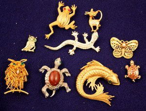 Nine Animal & Insect Figural Costume Pins: 9 pc lot includes, fish signed Monet, 2 owls (1 signed Nemo), 2 turtles, frog, cat, lizard and butterfly w/ faux pearl. Minor losses.